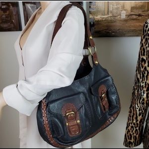 Beautiful new Carla Mancini brown authentic leather purse